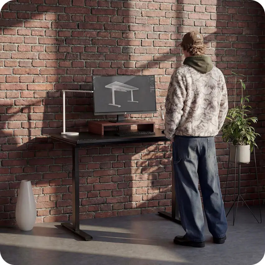 Atlas Lite electric standing desk with silent and stable height adjustment