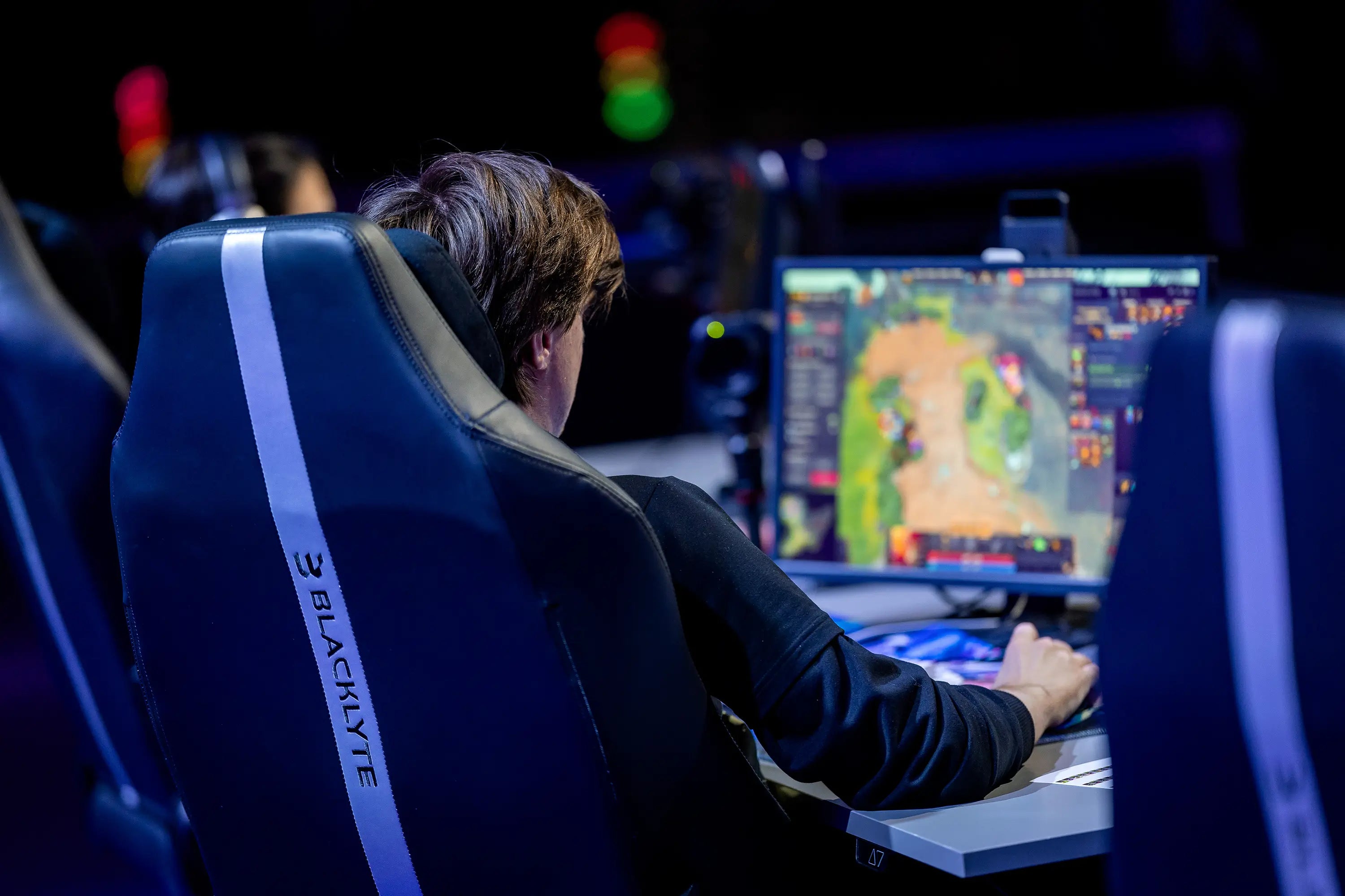 Professional Gamer Leaning Back in a Blacklyte Ergo Gaming Chair